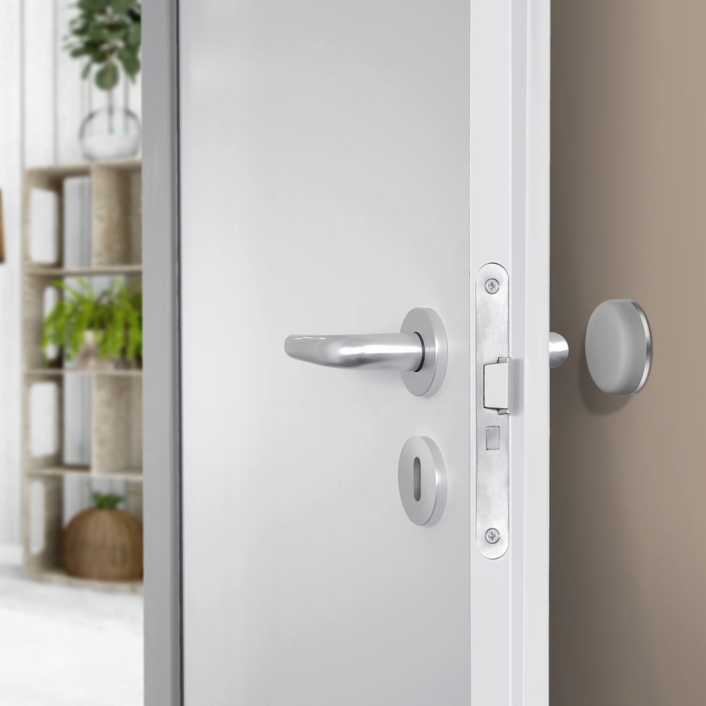 DÖRRSTOPP VÄGG GRÅ/ROSTRI